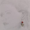 Antique silver plated decorative earrings with coral.