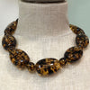 Mottled tortoise resin necklace
