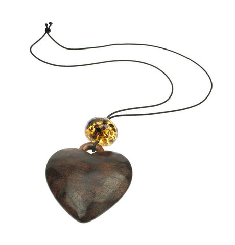 Heart pendant with faceted tortoise bead