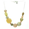 Subtle mixture of ivory, antique gold and coral bead necklace