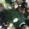 An organic blend of forest coloured resin bead necklace