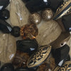 Eye catching mixture of black, bronze and tortoise necklace