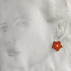 Orange diamante flower clip ear