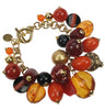 Gold plated and orange charm bracelet