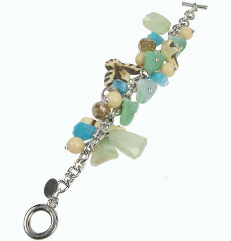 Turquoise and charm bracelet on silver plated chain