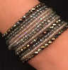 Stranded faceted glass bracelet in smoke and hematite