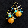 Amber and blue resin and glass drop earrings 100% of proceeds go to Ukrainian charities