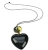 Black heart pendant with smoked yellow bead.