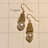 Faux pearl drops with gold plated resin finding.