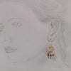 Antique silver plated decorative earrings with tortoise bead