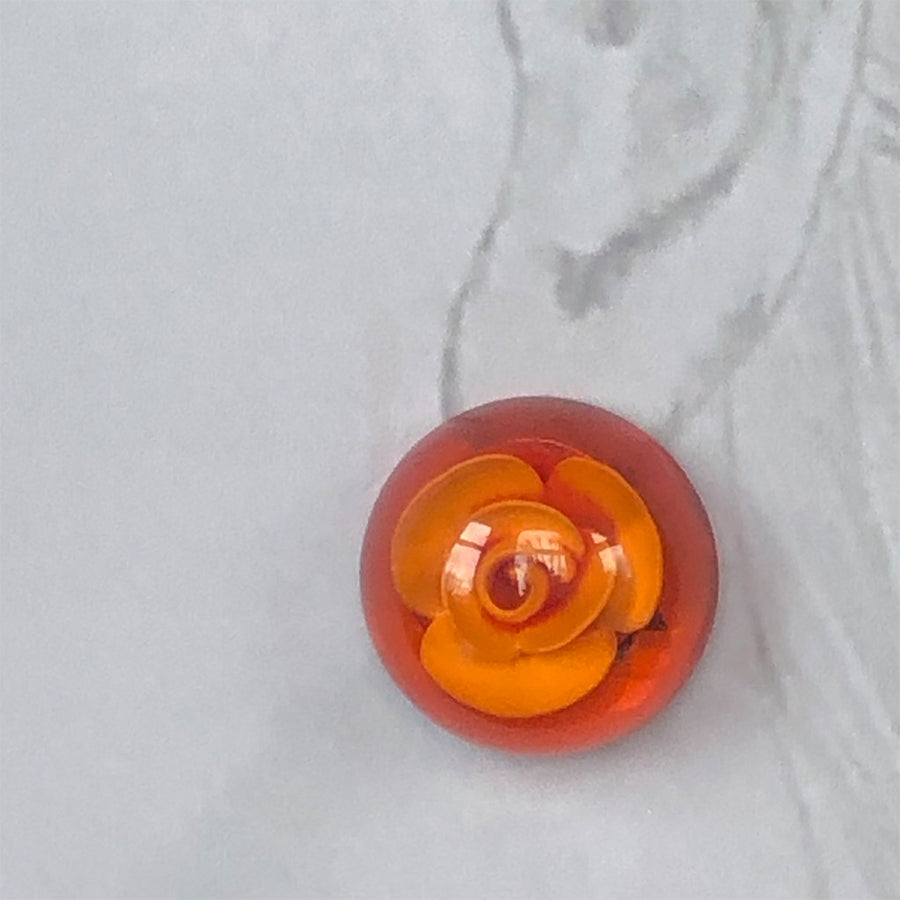 Clip hand carved orange coloured Italian earring