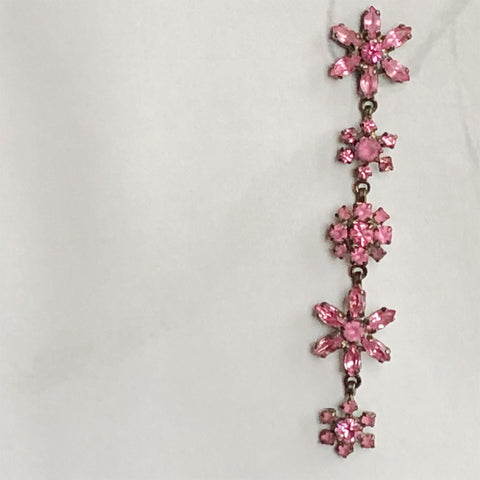 A cascade of pink flower earrings