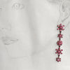 A cascade of pink flower earrings